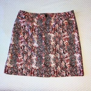 Cracked Wheat golf skort, reptile print, red-orange, grey & white, size 12